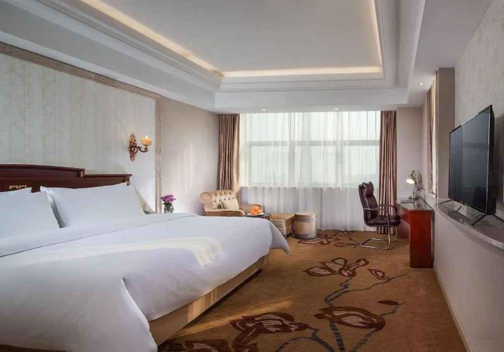 Bed in Vienna International Hotel Wuxi Taihu Expo Center