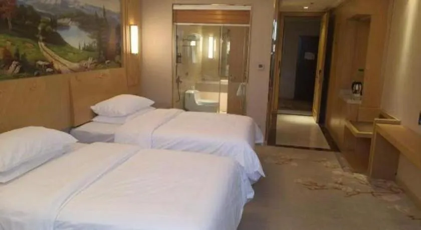 Bed in Vienna International Hotel Wuxi Taihu Expo Center