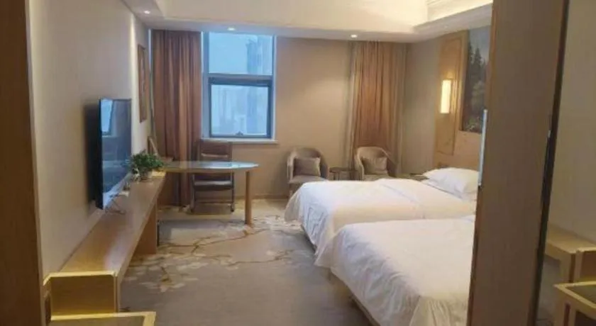 Bed in Vienna International Hotel Wuxi Taihu Expo Center
