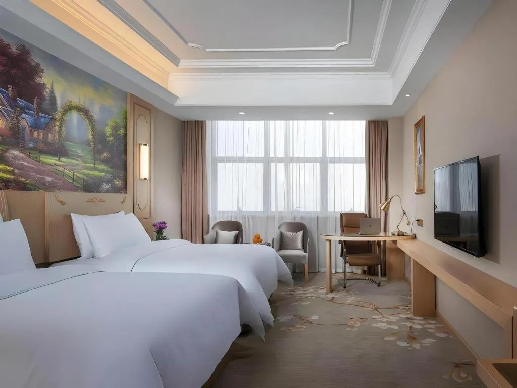 Bed in Vienna International Hotel Wuxi Taihu Expo Center