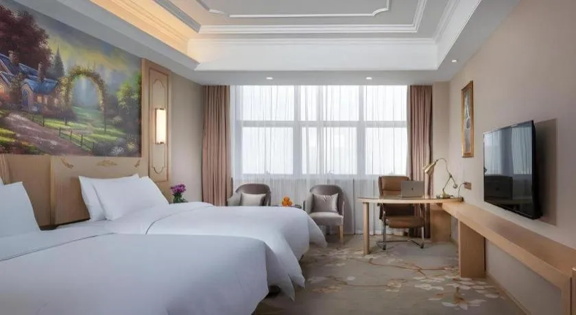 Bed in Vienna International Hotel Wuxi Taihu Expo Center