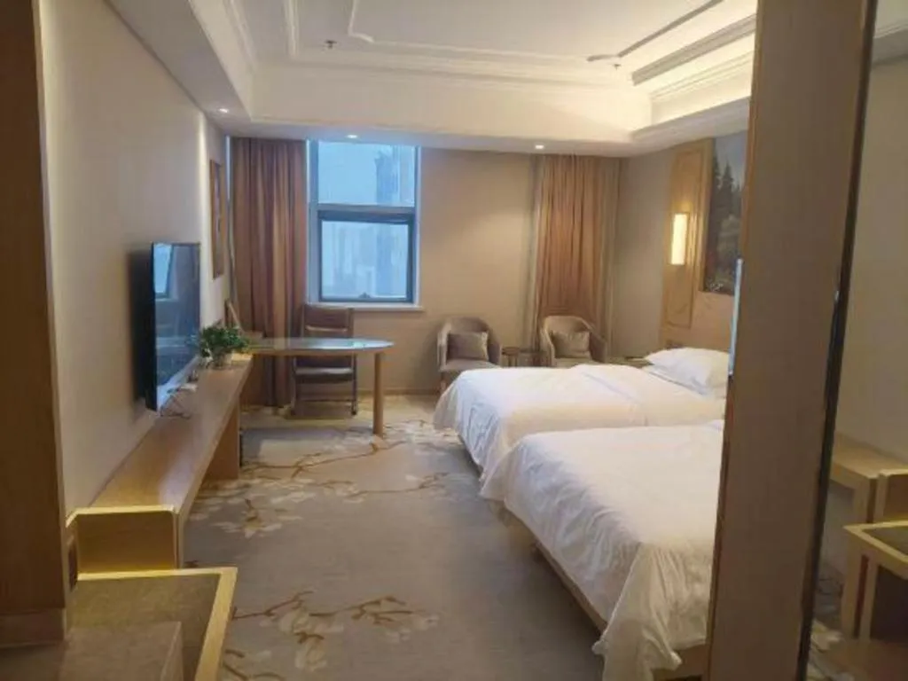 Bed in Vienna International Hotel Wuxi Taihu Expo Center