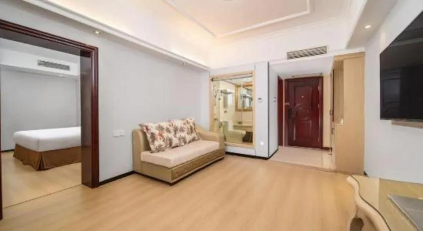 Bed in Vienna Hotel Shenzhen Pinghu Shuangyong Street Metro Station