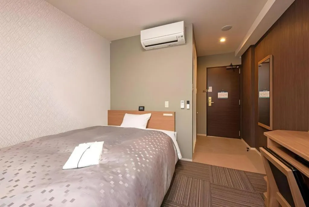 Bed in Kyoto Plaza Hotel Kyoto Station South