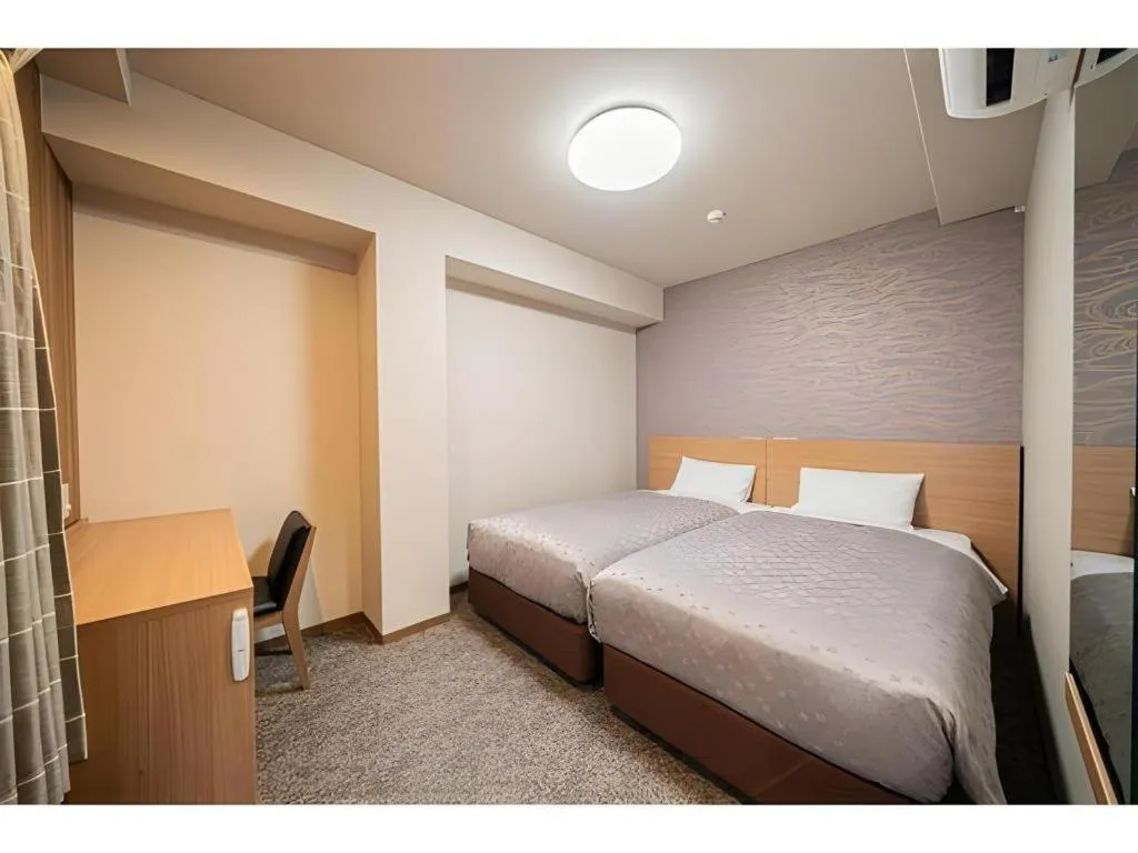 Bed in Kyoto Plaza Hotel Kyoto Station South