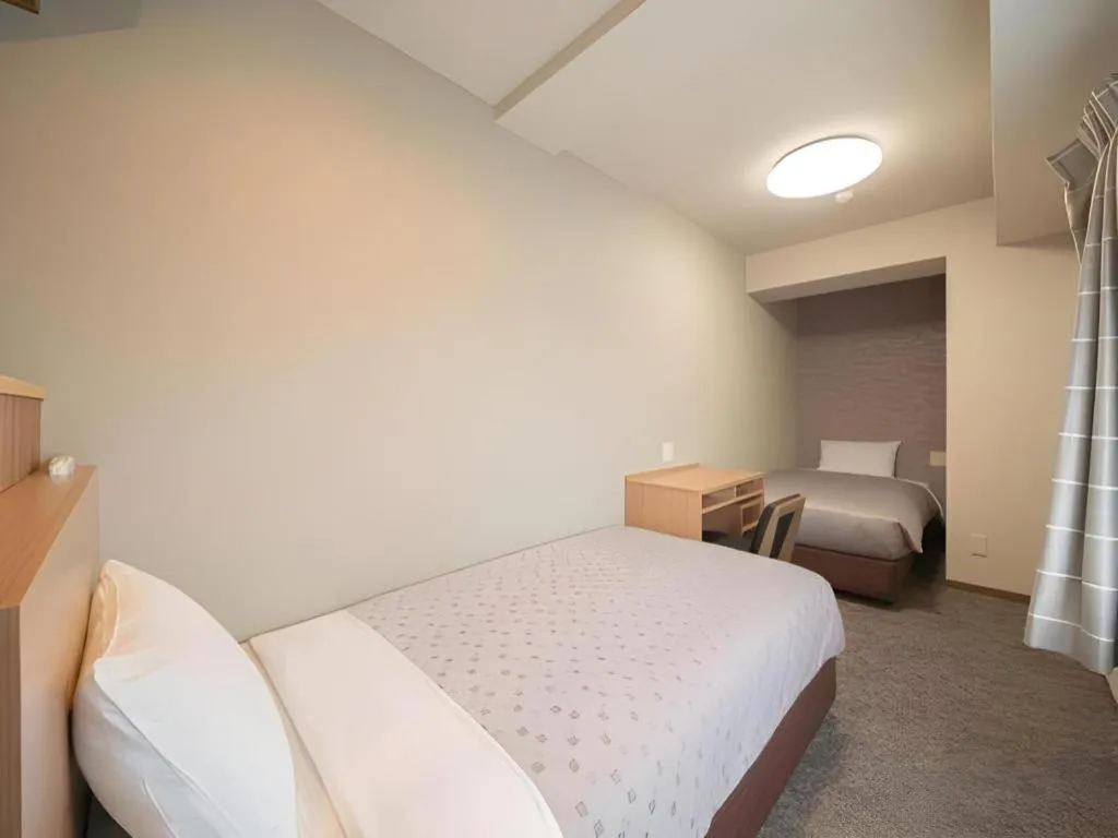 Bed in Kyoto Plaza Hotel Kyoto Station South