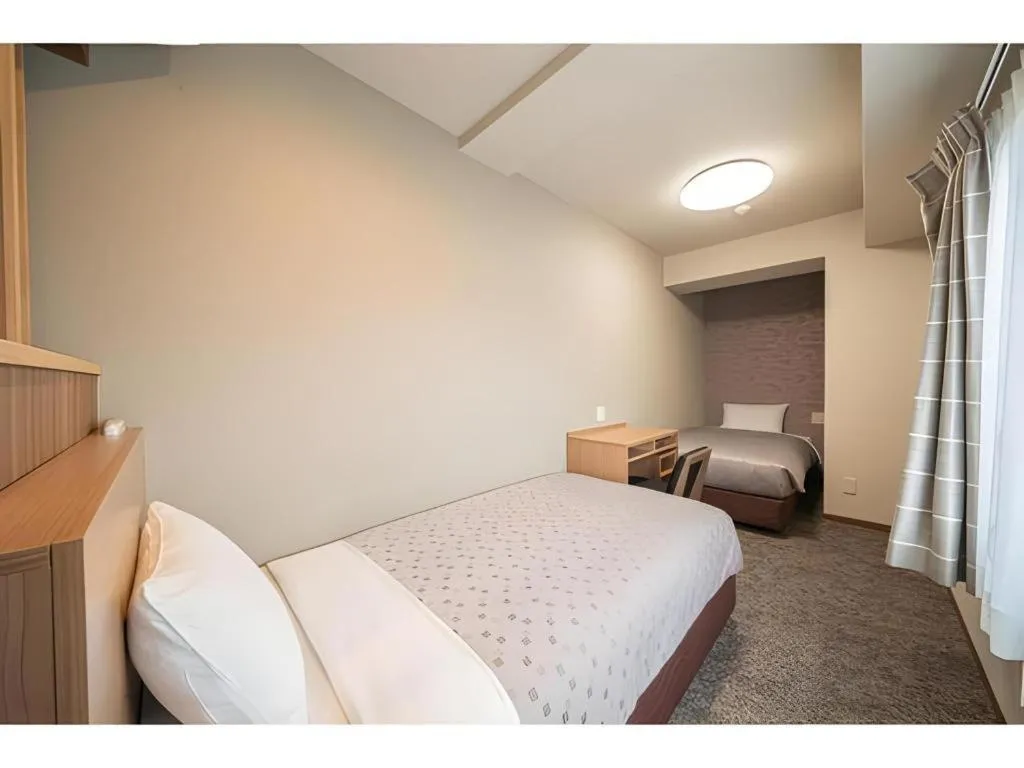 Bed in Kyoto Plaza Hotel Kyoto Station South