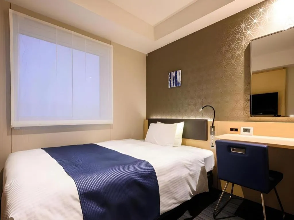 Bed in KEIKYU EX INN Haneda Innovation City 2 minutes walk from HICity Exit of Tenkubashi Station