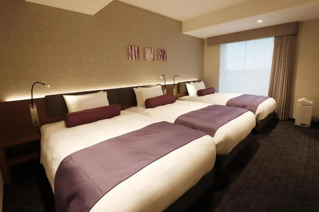 Bed in KEIKYU EX INN Haneda Innovation City 2 minutes walk from HICity Exit of Tenkubashi Station