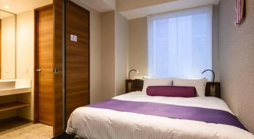 Bed in KEIKYU EX INN Haneda Innovation City 2 minutes walk from HICity Exit of Tenkubashi Station