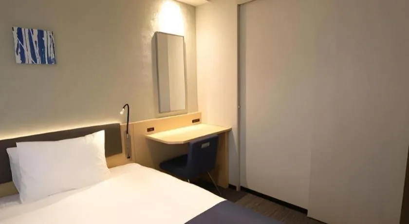Bed in KEIKYU EX INN Haneda Innovation City 2 minutes walk from HICity Exit of Tenkubashi Station