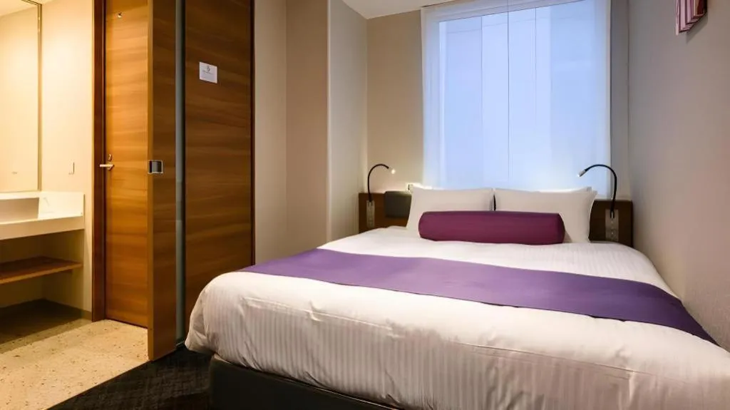 Bed in KEIKYU EX INN Haneda Innovation City 2 minutes walk from HICity Exit of Tenkubashi Station