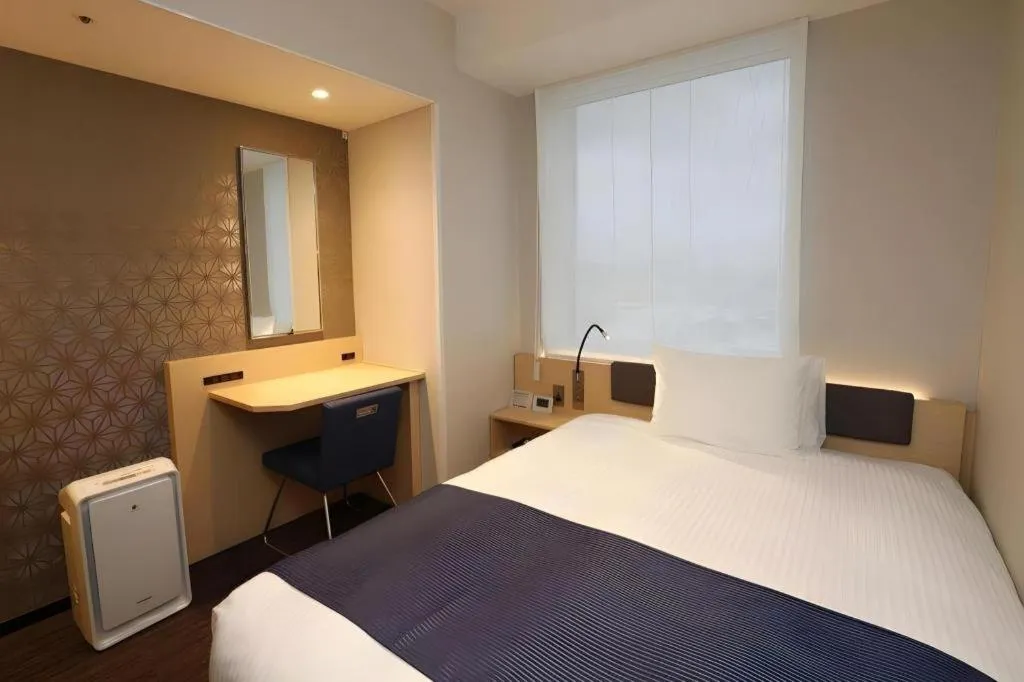 Bed in KEIKYU EX INN Haneda Innovation City 2 minutes walk from HICity Exit of Tenkubashi Station