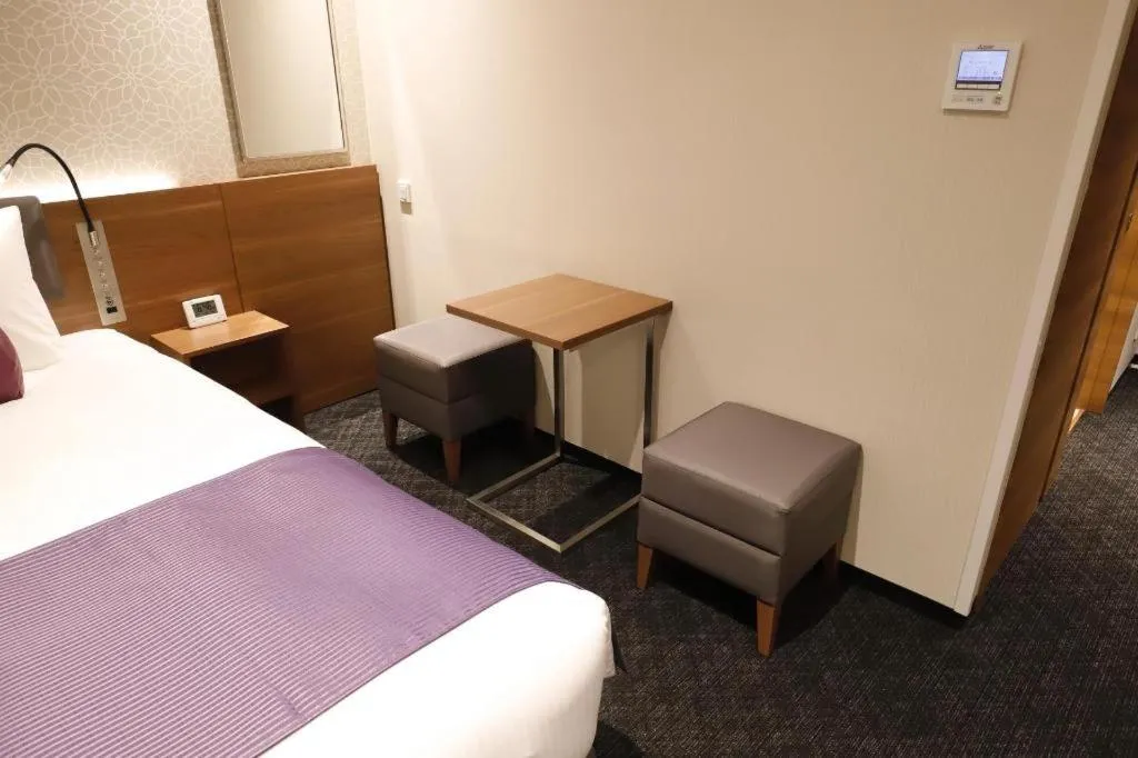 Bed in KEIKYU EX INN Haneda Innovation City 2 minutes walk from HICity Exit of Tenkubashi Station