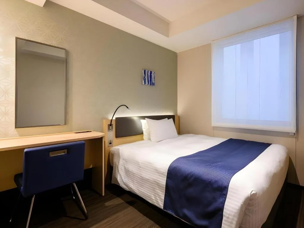 Bed in KEIKYU EX INN Haneda Innovation City 2 minutes walk from HICity Exit of Tenkubashi Station