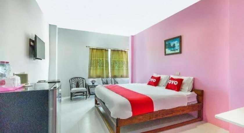 Bed in Thanagrit Apartelle