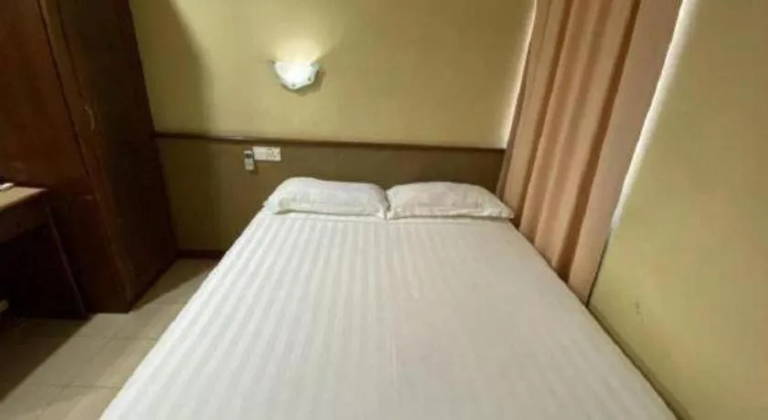 Bed in OYO 89958 Hotel Umimas