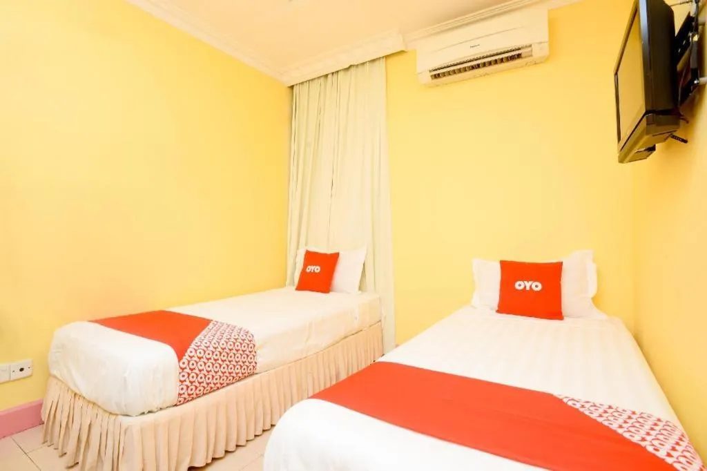 Bed in OYO 89958 Hotel Umimas