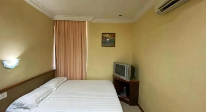 Bed in OYO 89958 Hotel Umimas