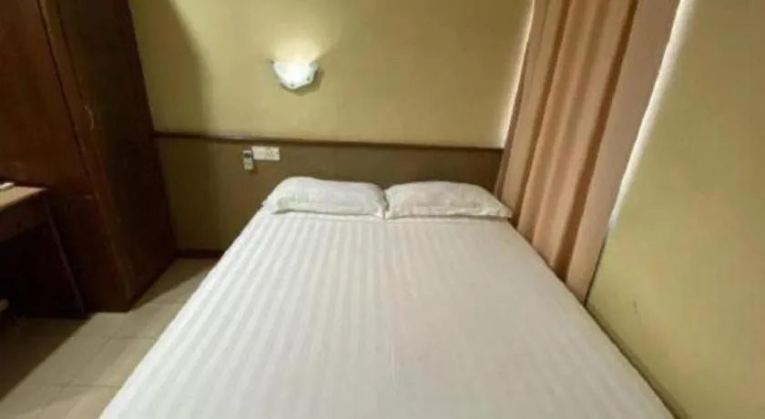 Bed in OYO 89958 Hotel Umimas