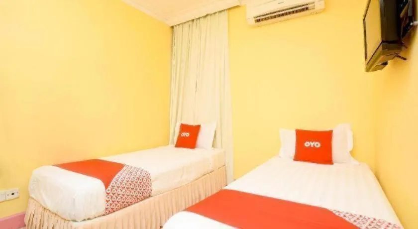 Bed in OYO 89958 Hotel Umimas