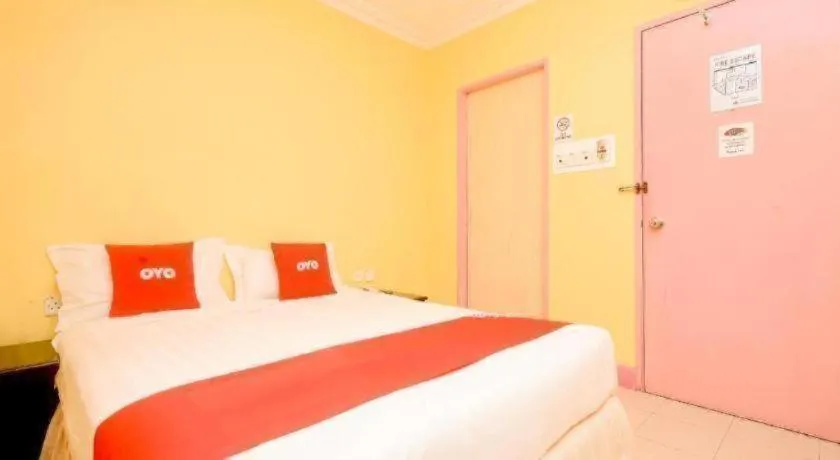 Bed in OYO 89958 Hotel Umimas