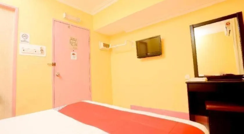 Bed in OYO 89958 Hotel Umimas