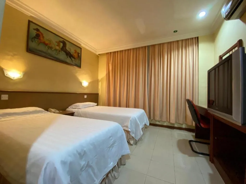 Bed in OYO 89958 Hotel Umimas