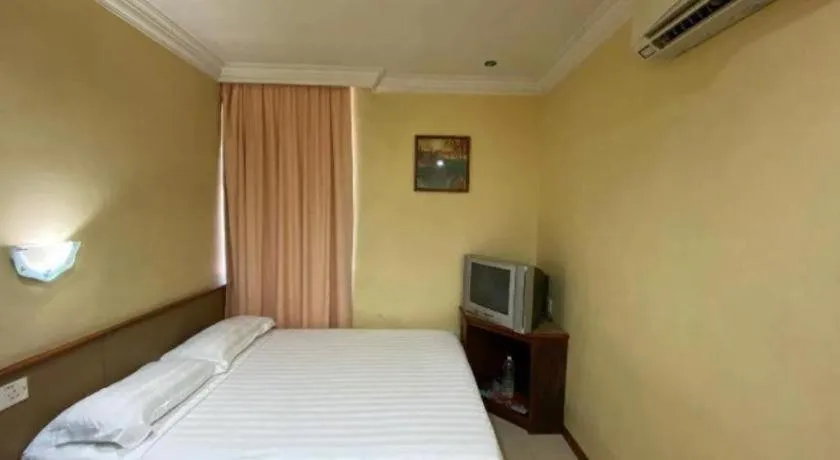 Bed in OYO 89958 Hotel Umimas