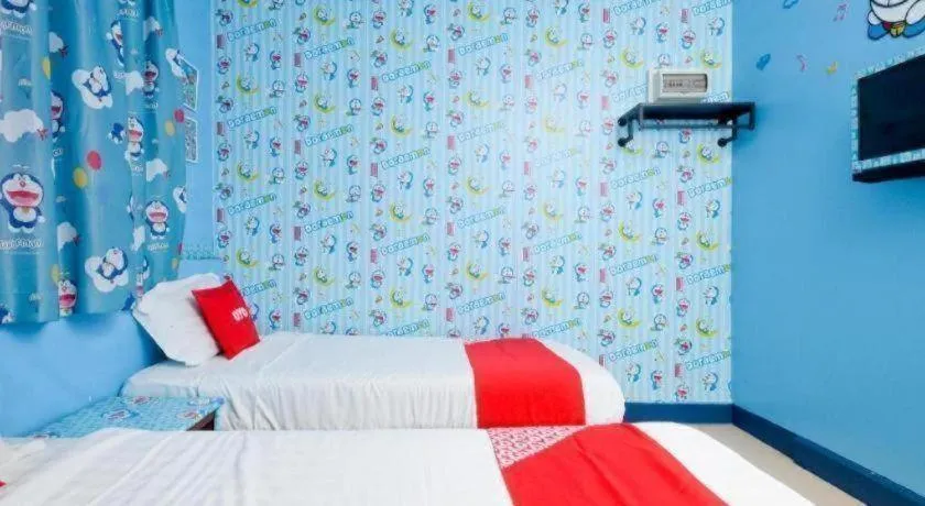 Bed in OYO 89958 Hotel Umimas