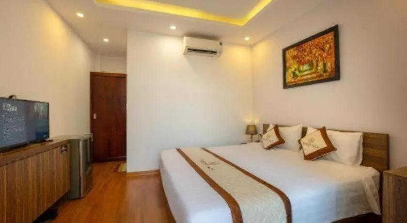 Bed in Hoi An Paradise Villa