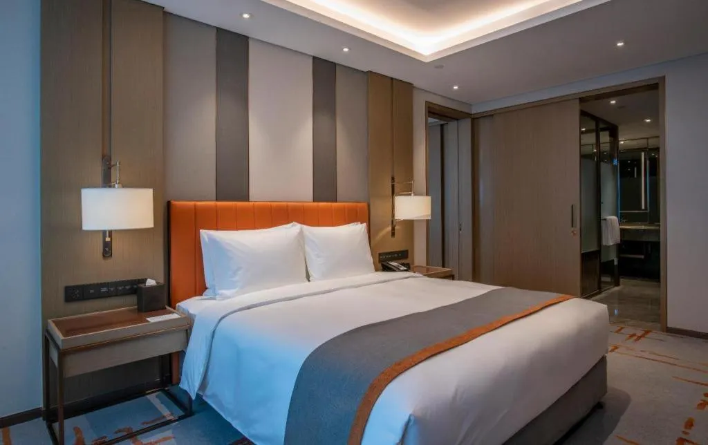 Bed in Hui Feng Wan Yun Hotel Hefei