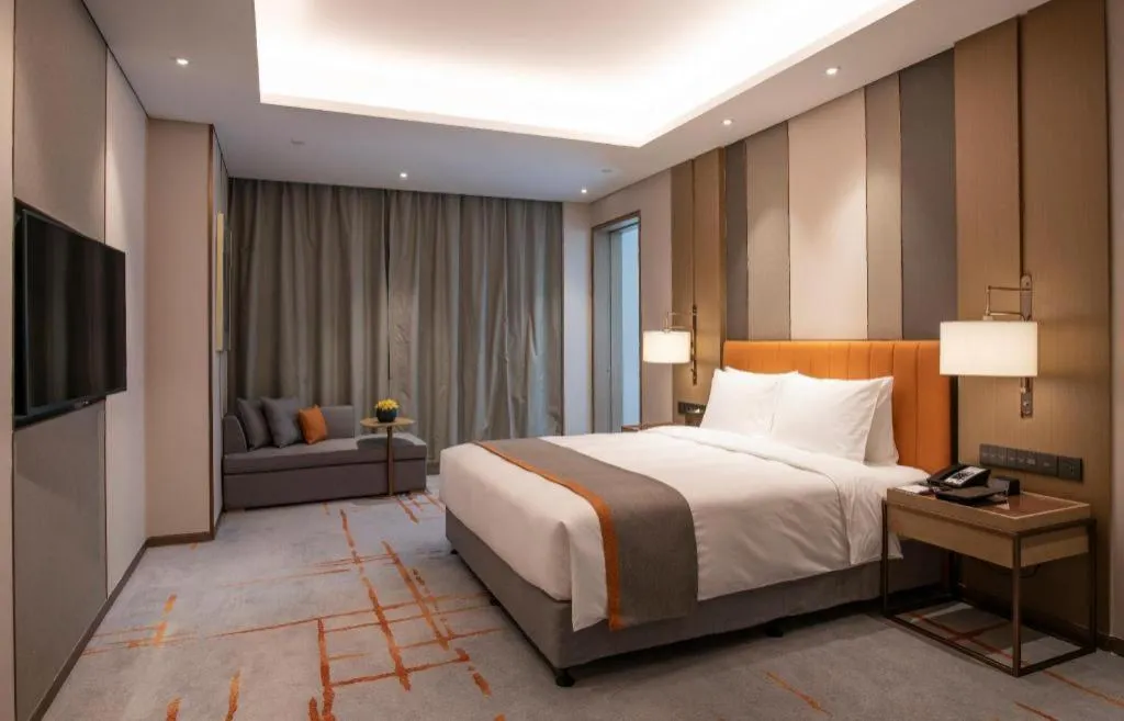 Bed in Hui Feng Wan Yun Hotel Hefei