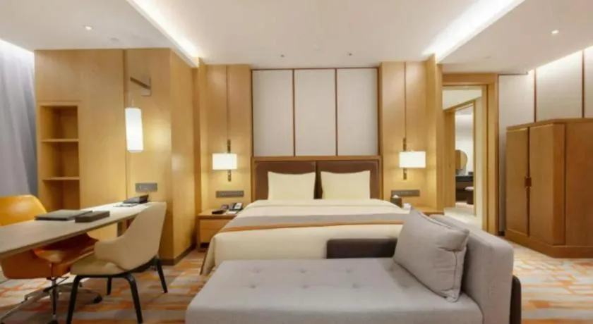 Bed in Hui Feng Wan Yun Hotel Hefei