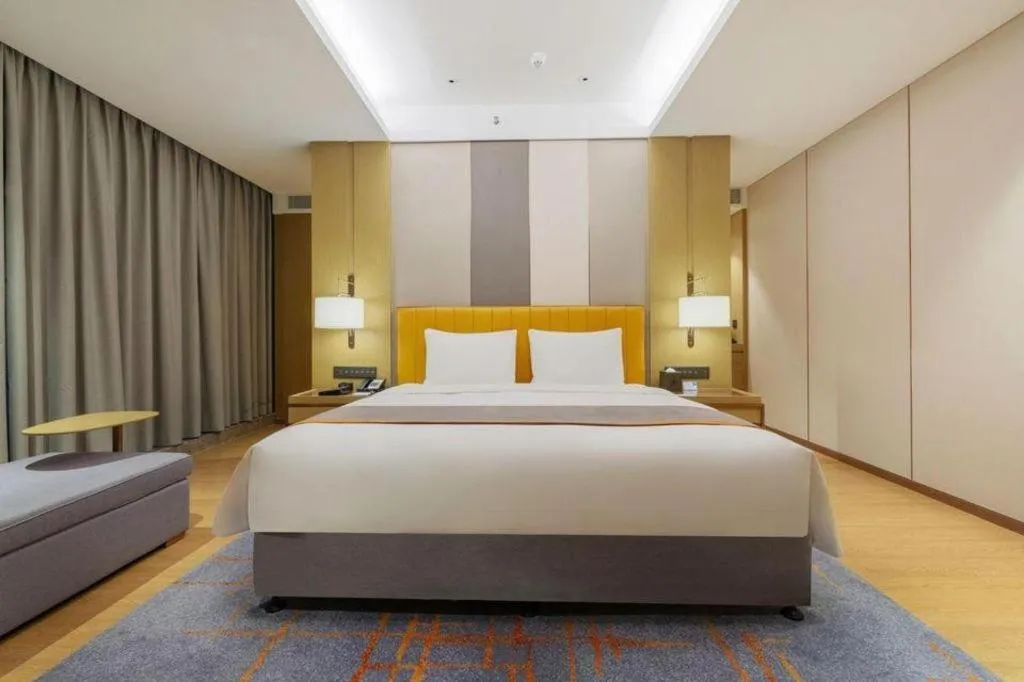 Bed in Hui Feng Wan Yun Hotel Hefei