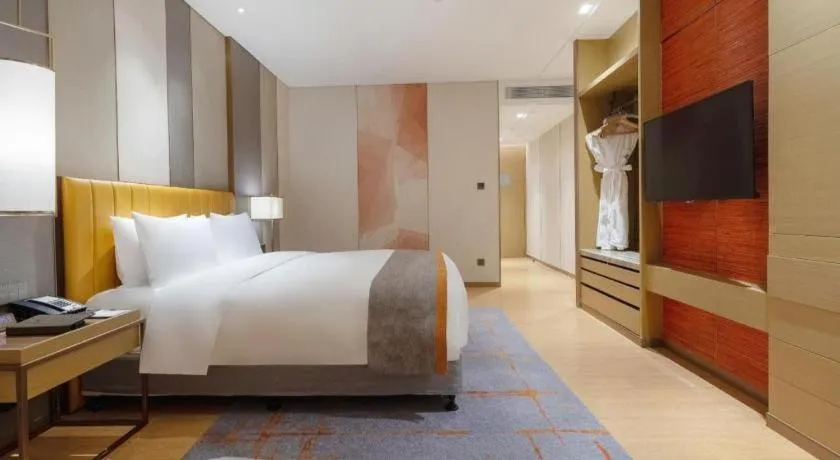 Bed in Hui Feng Wan Yun Hotel Hefei