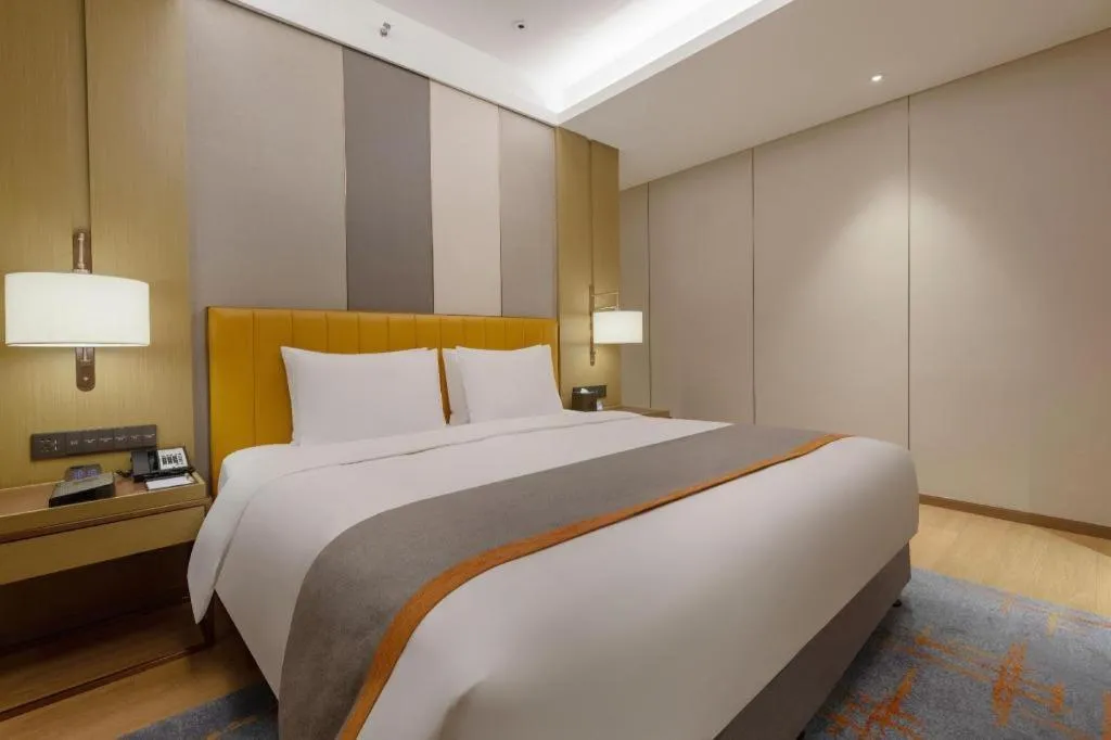 Bed in Hui Feng Wan Yun Hotel Hefei