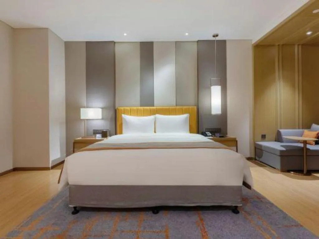 Bed in Hui Feng Wan Yun Hotel Hefei