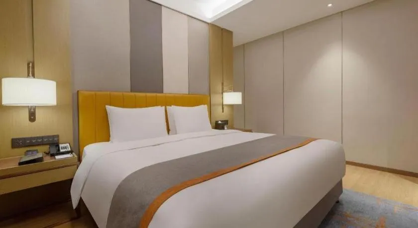 Bed in Hui Feng Wan Yun Hotel Hefei