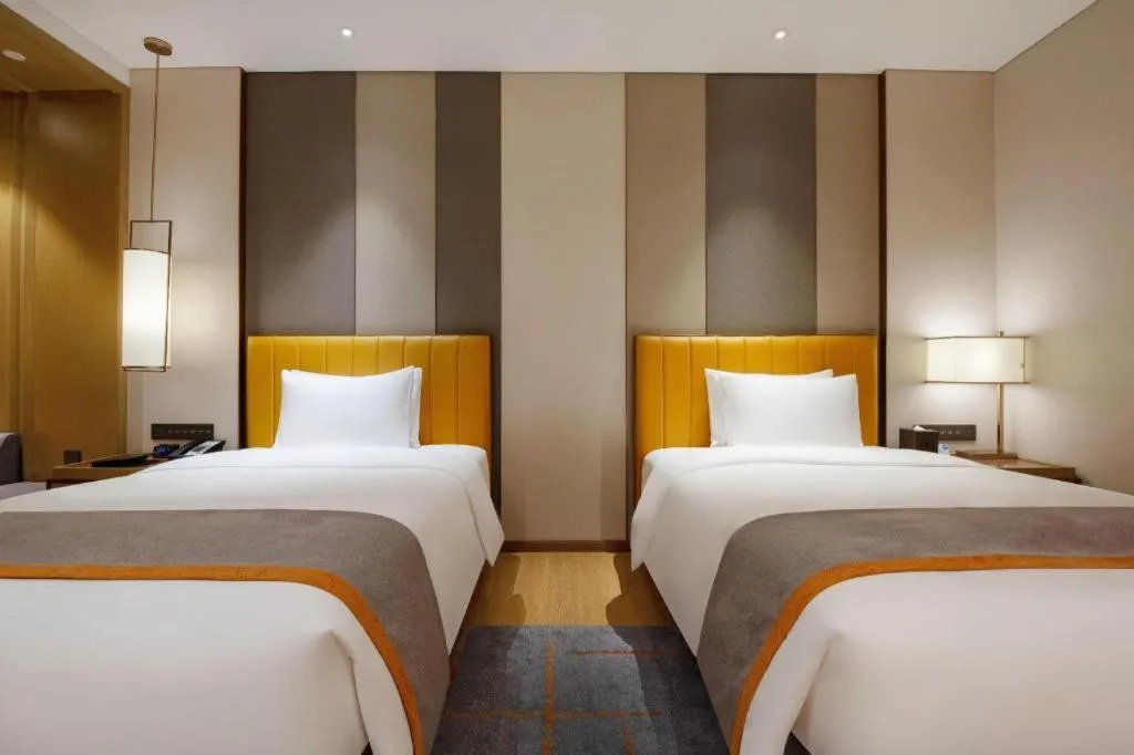 Bed in Hui Feng Wan Yun Hotel Hefei