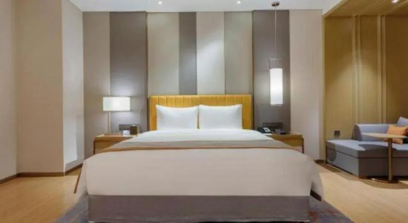 Bed in Hui Feng Wan Yun Hotel Hefei