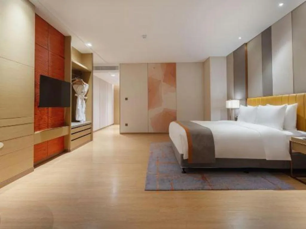 Bed in Hui Feng Wan Yun Hotel Hefei