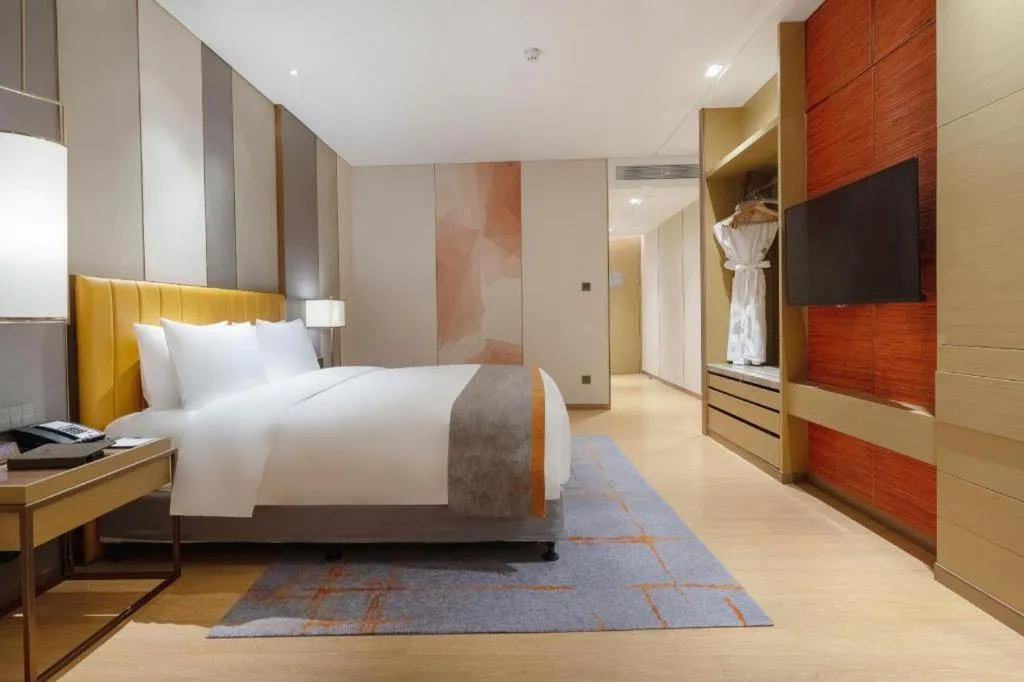 Bed in Hui Feng Wan Yun Hotel Hefei