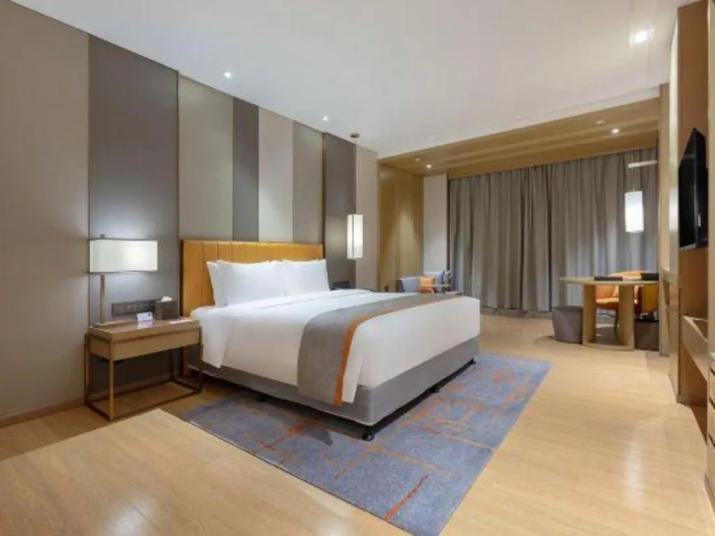 Bed in Hui Feng Wan Yun Hotel Hefei