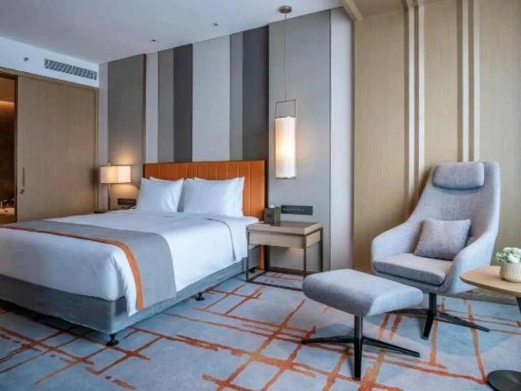 Bed in Hui Feng Wan Yun Hotel Hefei