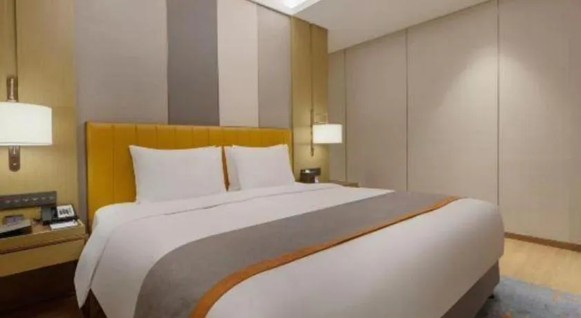 Bed in Hui Feng Wan Yun Hotel Hefei