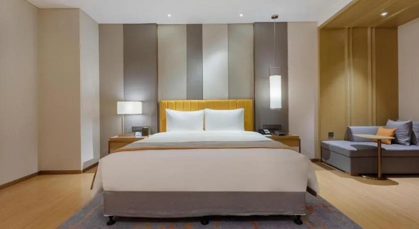 Bed in Hui Feng Wan Yun Hotel Hefei