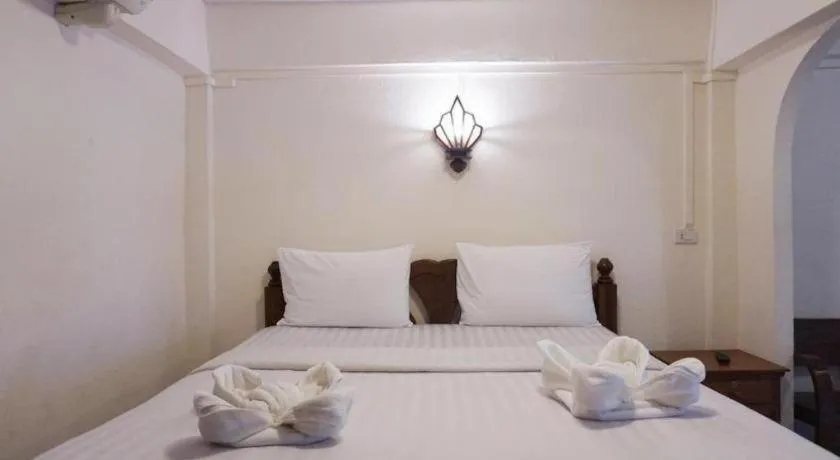 Bed in Nan Lanna Hotel