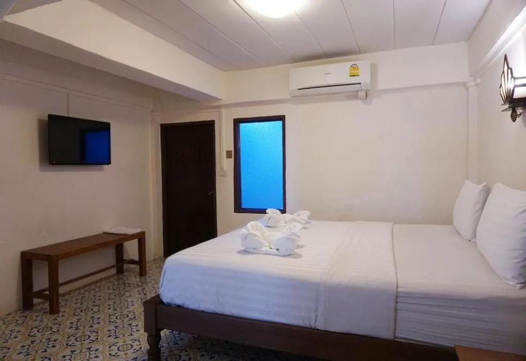 Bed in Nan Lanna Hotel