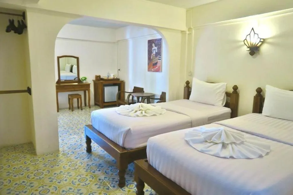 Bed in Nan Lanna Hotel